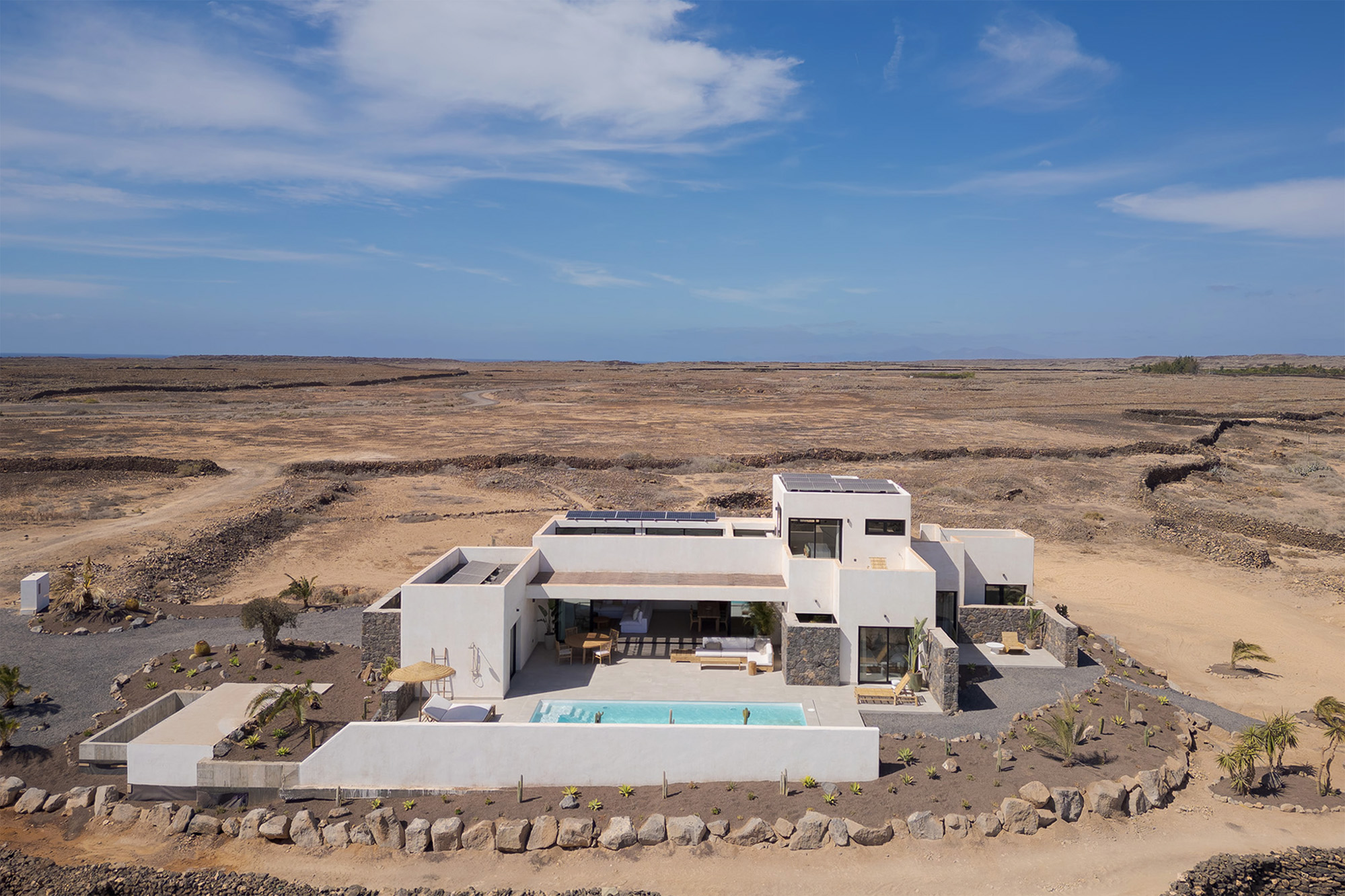 Villa Victorina surrounded by the volcanic desert landscape of Fuerteventura